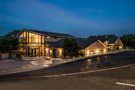 Facility exterior at evening